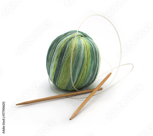 Knitting and knitting needles on white background