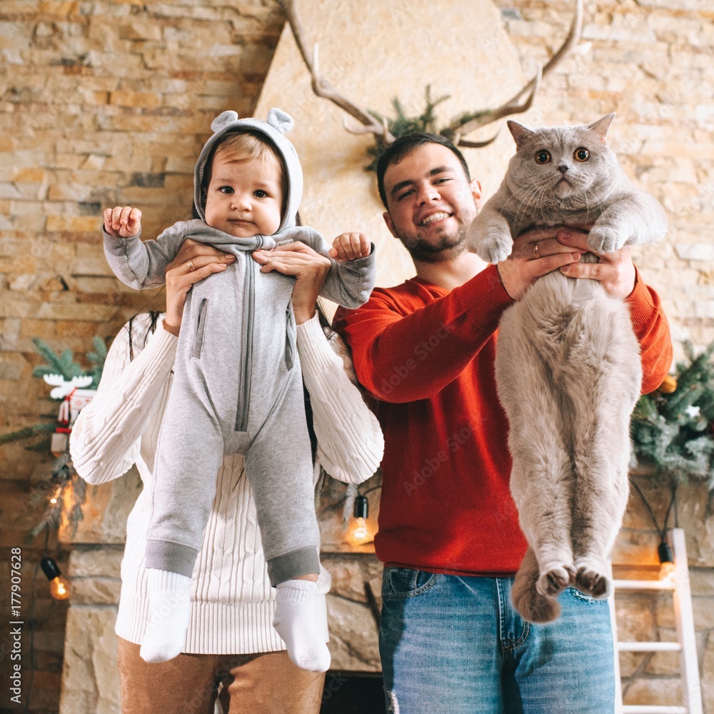 christmas mom dad son and cat