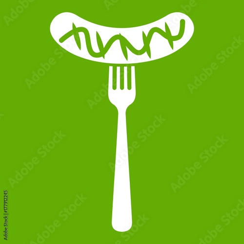 Grilled sausage on a fork mustard icon green