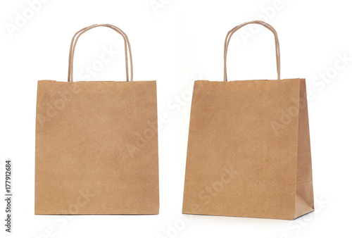 Recycled paper shopping bag on white background. photo