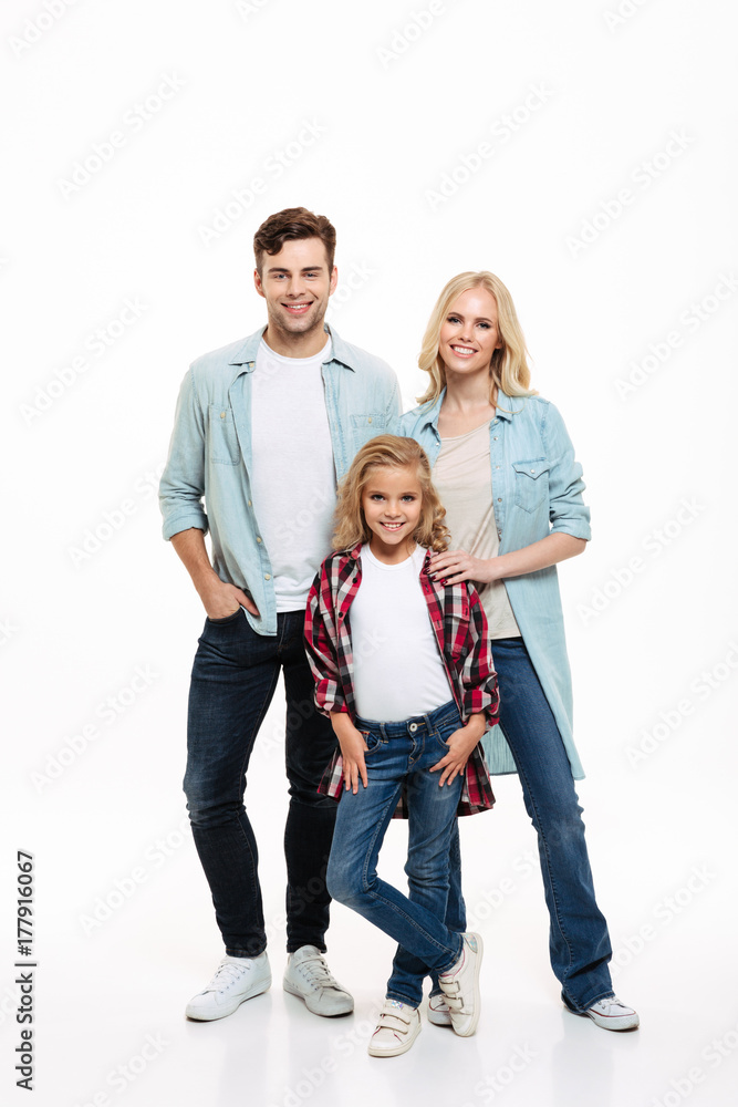 Full length portrait of a happy smiling family with a child Full length portrait of a happy smiling family with a child