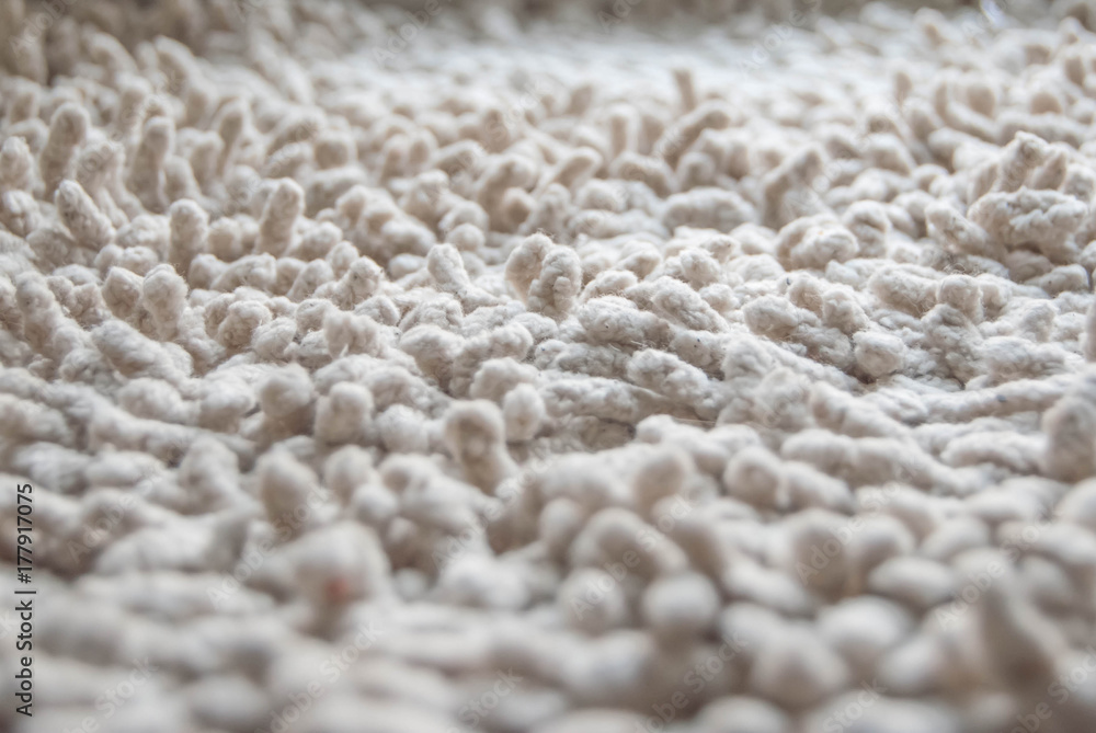texture of a white carpet with a fringe texture of a white carpet with a fringe