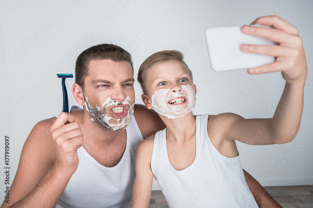 father and son shaving together