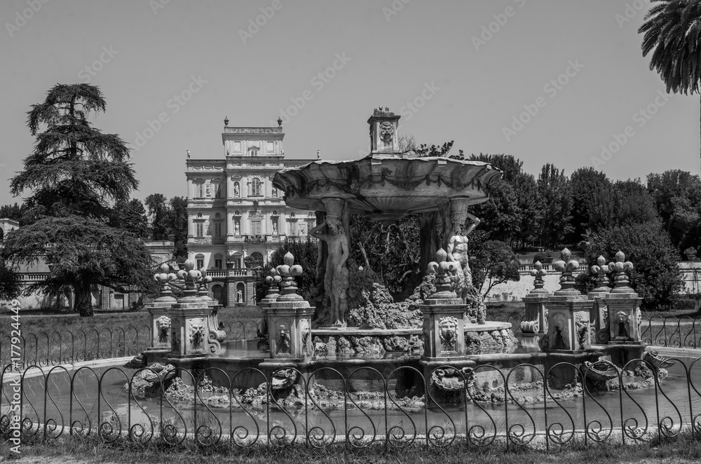 Fototapeta premium Antique old fountain in the park Giardino Del Teatro of Villa Doria-Pamphili in Rome, Italy