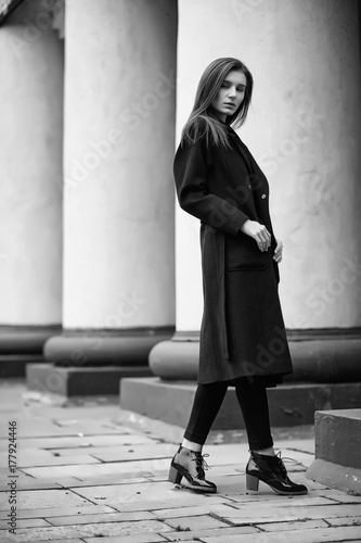 Girl in a coat black and white photo © alexkich