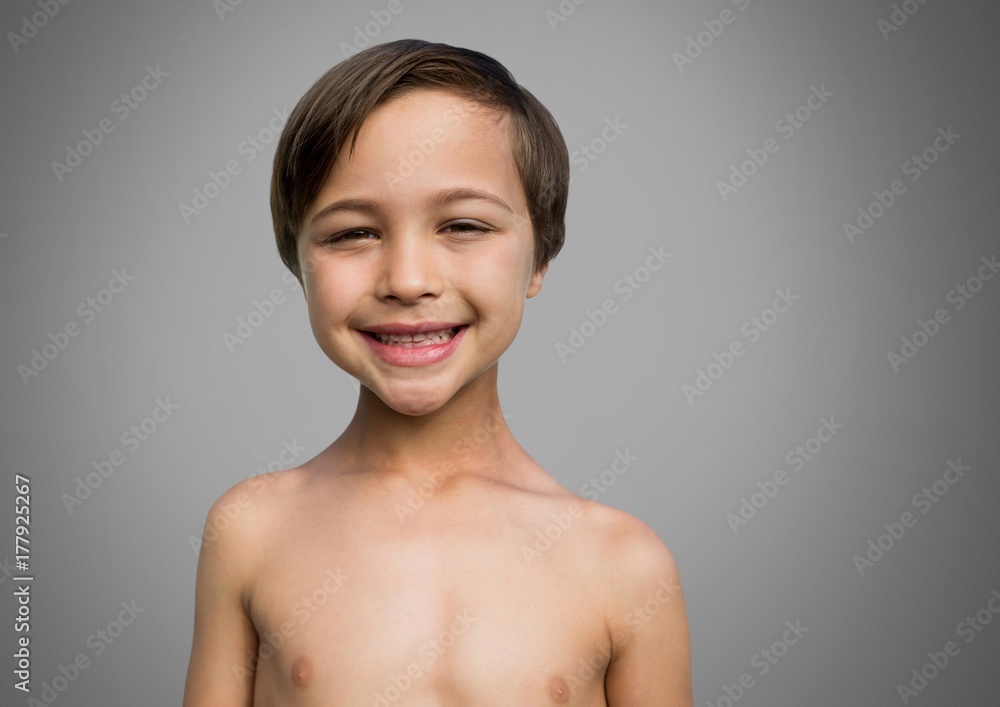 Obraz premium Boy against grey background smiling