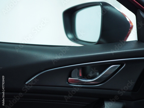 car door lock and rear mirror  background © Orathai