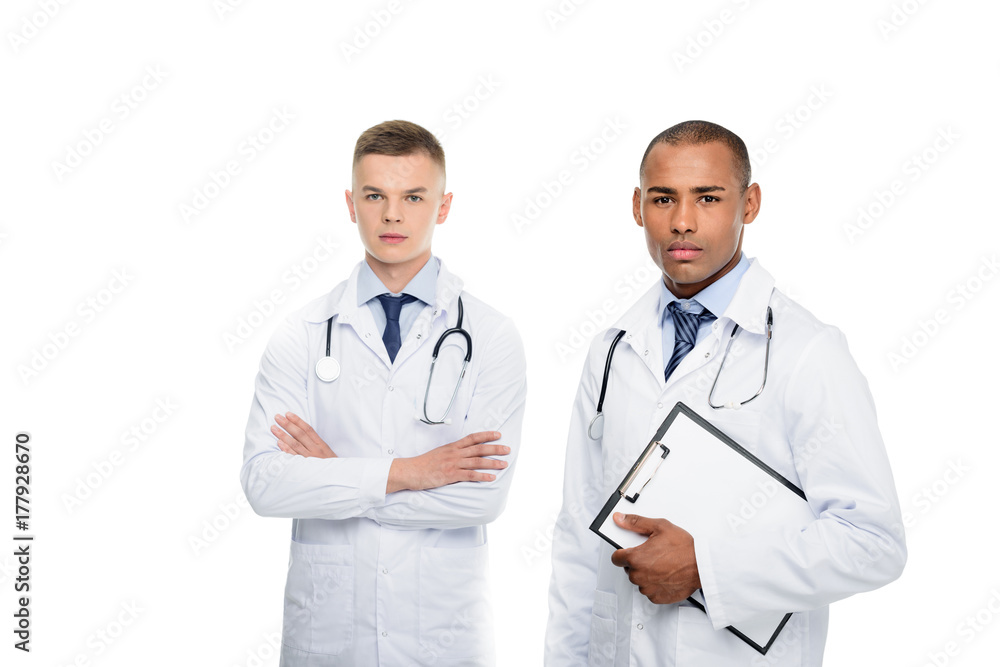 multiethnic male doctors with stethoscopes multiethnic male doctors with stethoscopes