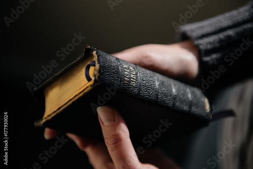 Woman holding bible photo