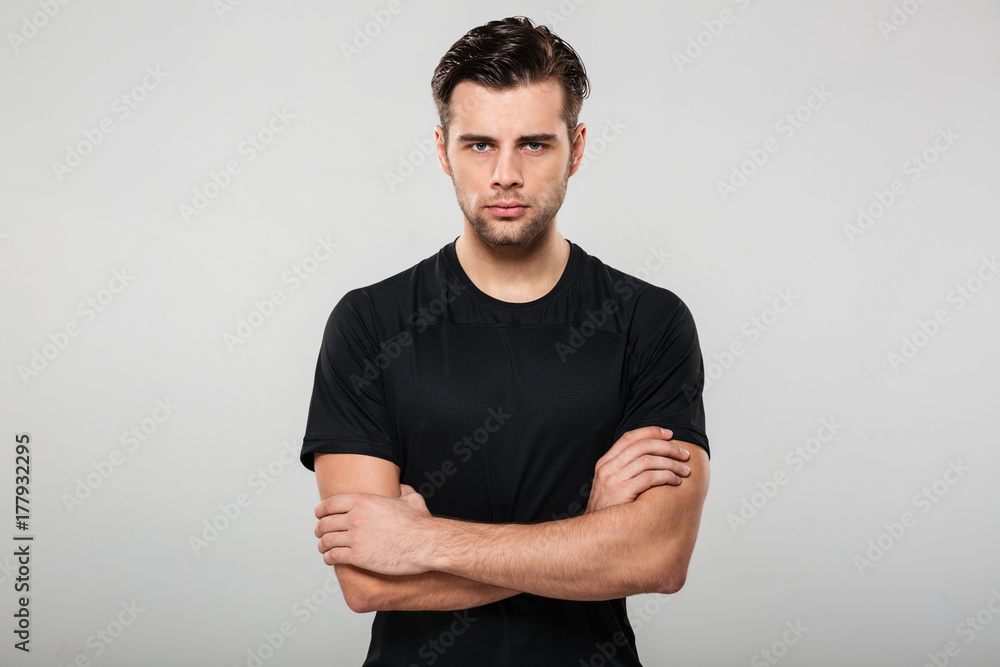 Portrait of a concentrated serious sportsman Portrait of a concentrated serious sportsman