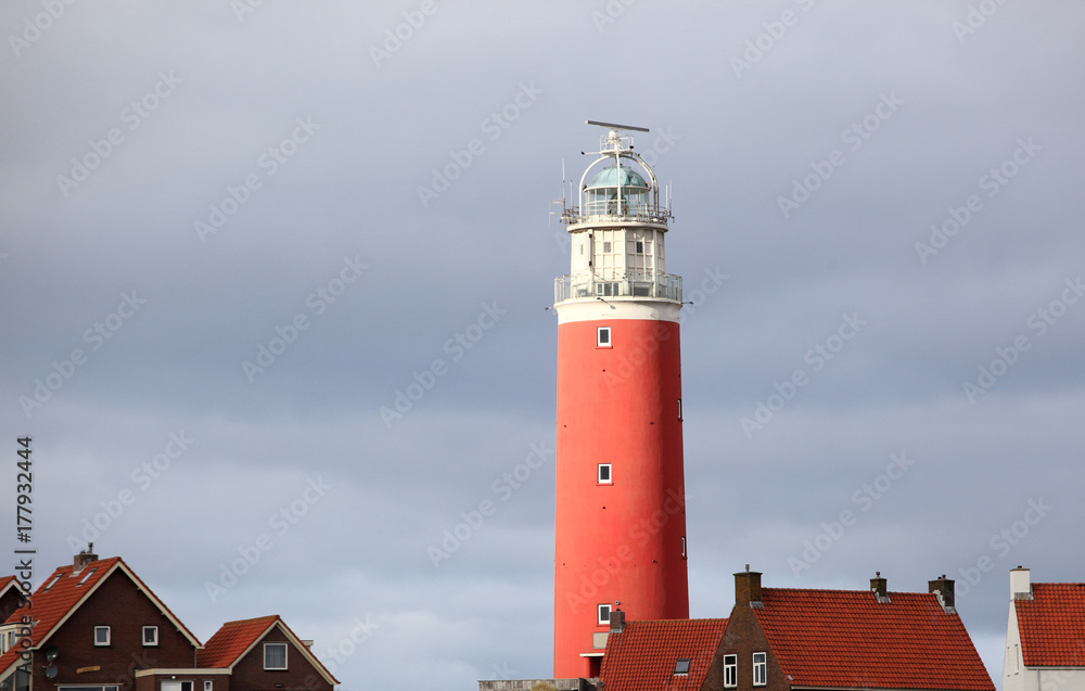 Red lighthouse in late sunlight Red lighthouse in late sunlight
