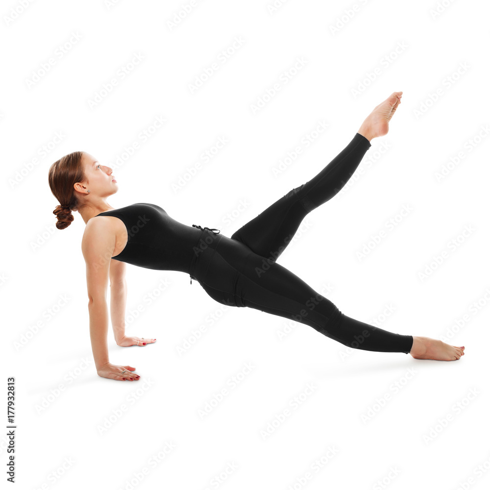 Sporty young woman doing yoga practice isolated on white background