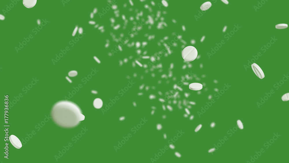 Falling pills with green background