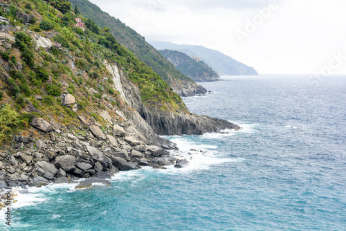Beautiful view to blue sea and mountains. Vernazza, Cinque Terre, Italy