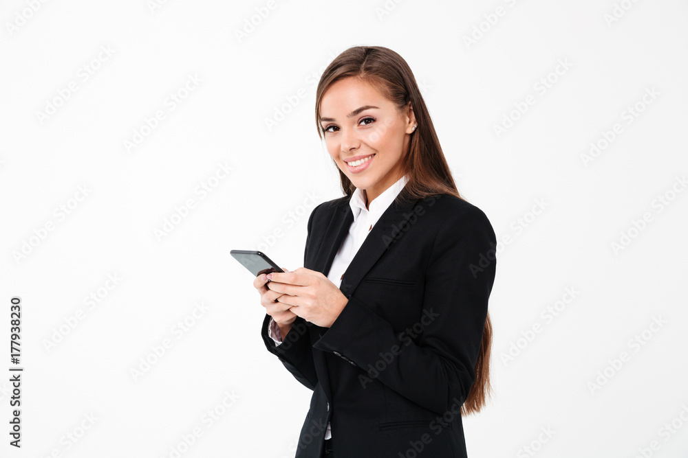 Happy pretty businesswoman chatting by phone. Happy pretty businesswoman chatting by phone.