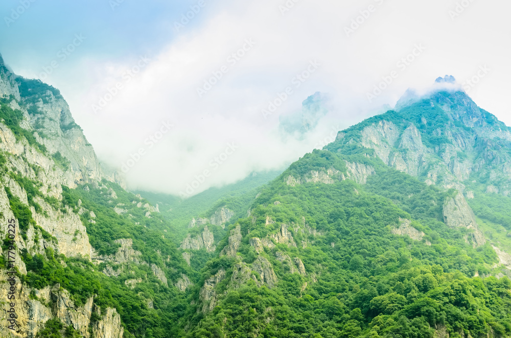 Beautiful view of green Ossetian mountain peak Beautiful view of green Ossetian mountain peak