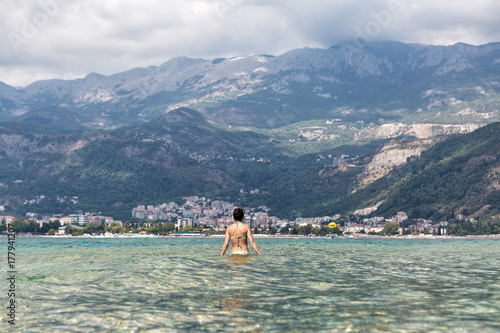  woman in bikini in sea in summer vacation