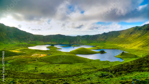 Landscape sunset view to Caldeirao crater, Corvo island, Azores, Portugal photo