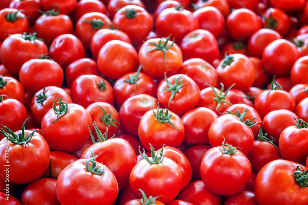 Red tomato fruits, top view, background and texture Red tomato fruits, top view, background and texture