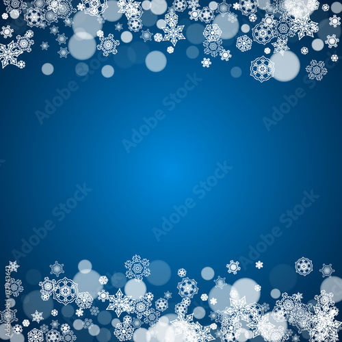 Winter border with white snowflakes for Christmas and New Year celebration. Holiday winter border on blue background for banners, gift coupons, vouchers, ads, party events. Falling frosty snowflakes.