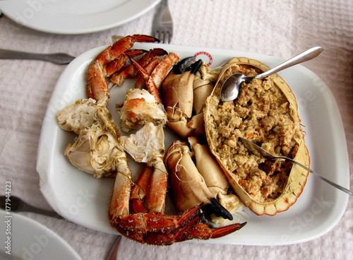 Traditional Portuguese seafood dish brown crab (Cancer pagurus), known as Sapateira Recheada photo