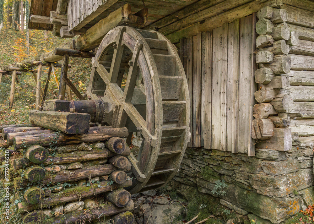 Historical water mill in bavaria with water wheel. Stock Photo | Adobe Stock