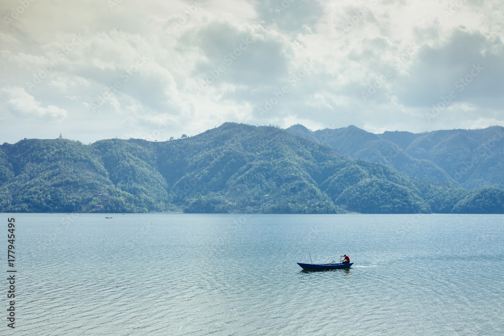 A fisherman on Lake Fewa, Pokhara, Nepal. A fisherman on Lake Fewa, Pokhara, Nepal.