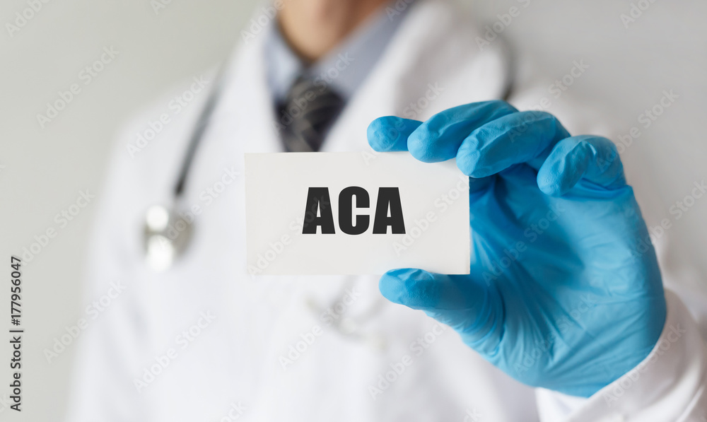 Doctor holding a card with text ACA, medical concept Doctor holding a card with text ACA, medical concept