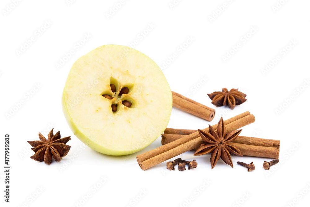 Aromatic apple, star anise, cloves and cinnamon isolated on white background Aromatic apple, star anise, cloves and cinnamon isolated on white background