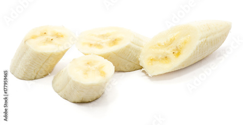 Group of four peeled banana slices isolated on white background