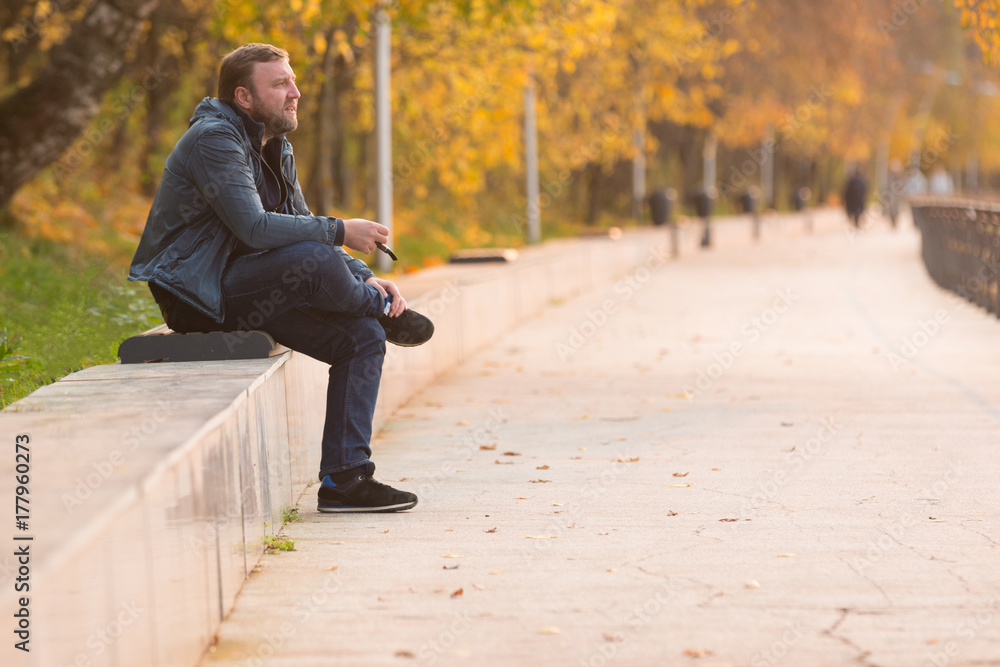 Man in park in autumn time Man in park in autumn time