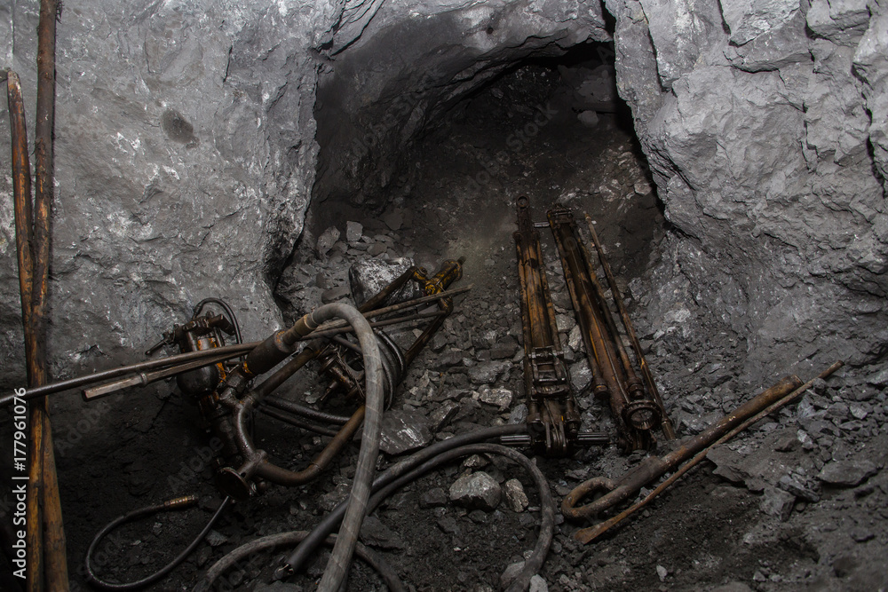 Fototapeta premium Underground abandoned ore mine shaft tunnel gallery drilling