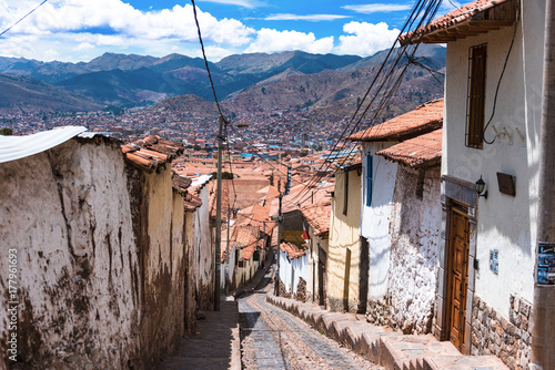 Street with steps overlooking Cusco rooftops. photo