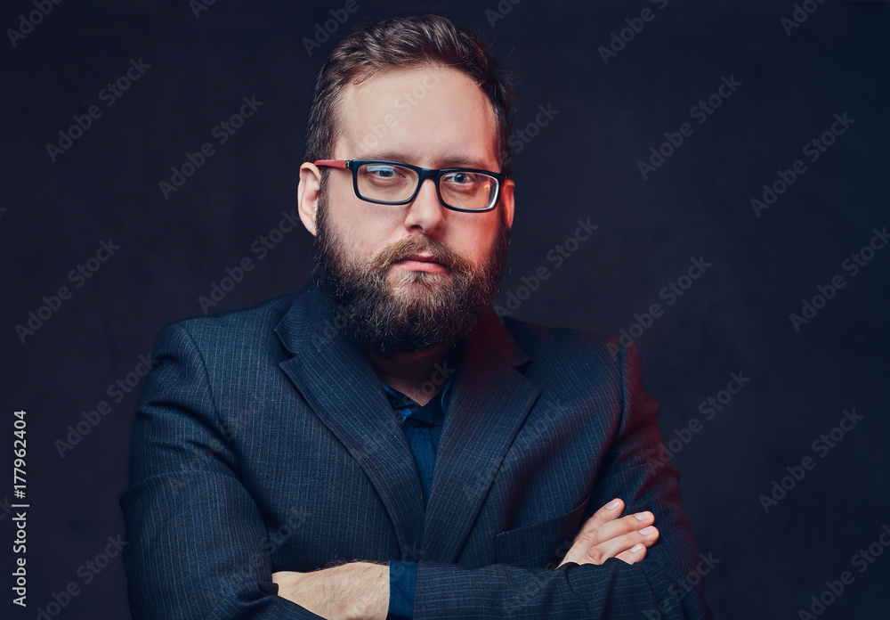 Serious plump male in eyeglasses over grey background. Serious plump male in eyeglasses over grey background.