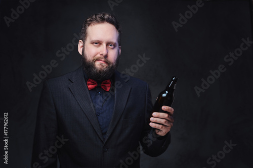 A man drinks craft beer.