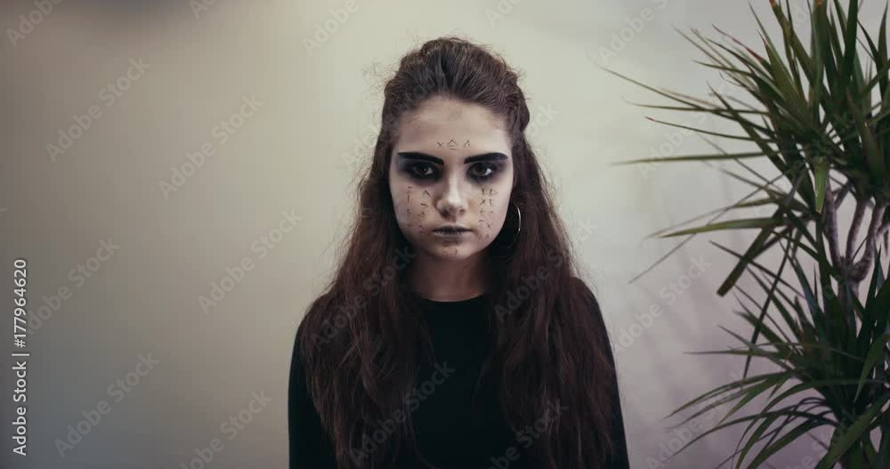 The lady with make have the genre of Egyptian mummy. Concept halloween. Slow Motion The lady with make have the genre of Egyptian mummy. Concept halloween. Slow Motion