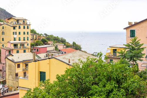 Fototapeta Naklejka Na Ścianę i Meble -  View to buildings and sea in a foggy day. Vernazza, Cinque Terre, Italy