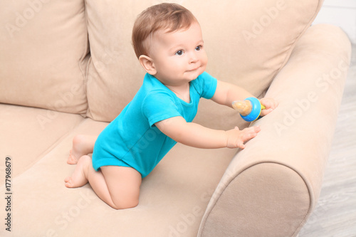 Cute little baby with nibbl...