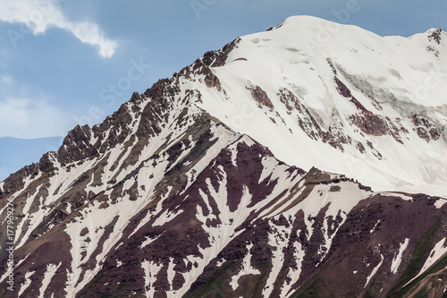 View of Tulpar Kul lake in Kyrgyzstan during the storm photo