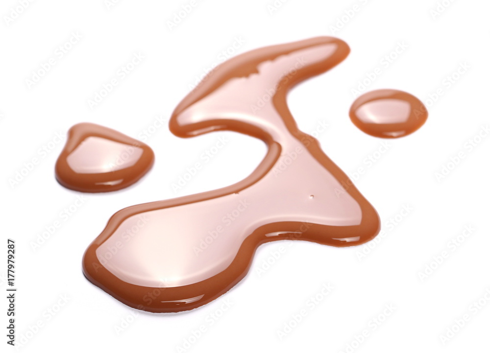 Spilled chocolate milk puddle isolated on white background Spilled chocolate milk puddle isolated on white background