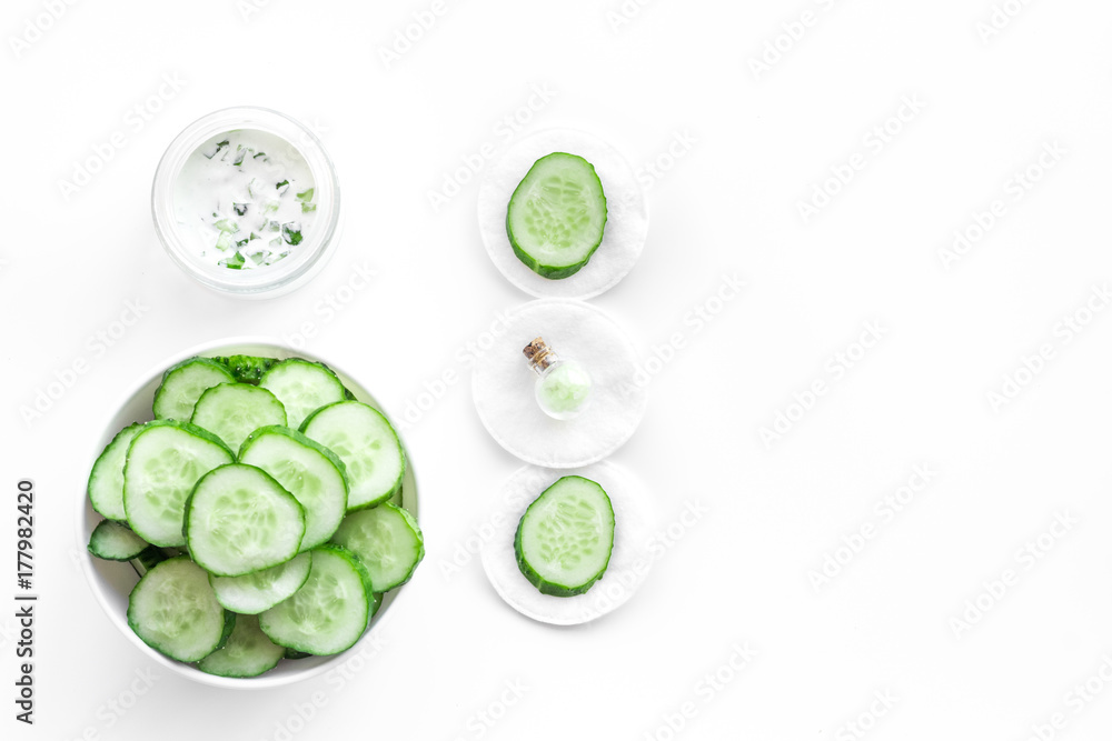 Sliced cucumber for face mask on white background top view copyspace Sliced cucumber for face mask on white background top view copyspace