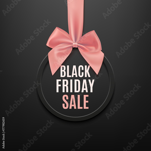 Black Friday round banner with pink ribbon and bow.
