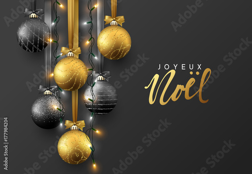 Joyeux Noel. Christmas greeting card, design of xmas ball with realistic garlands on dark background.
