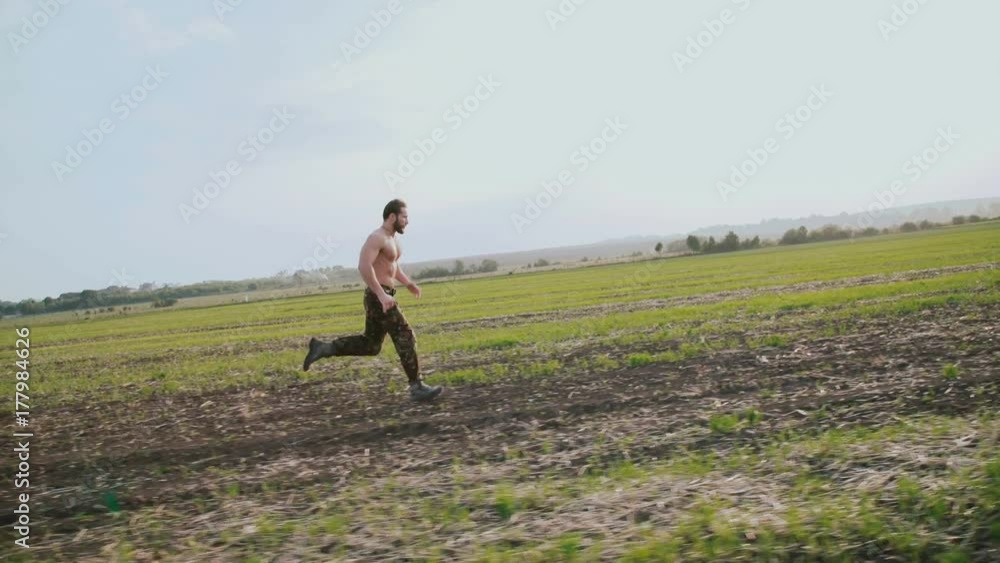 Very fast running of jogger in the fields on a nature. 4K Very fast running of jogger in the fields on a nature. 4K