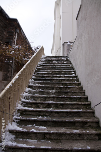 Old icy stairs in winter