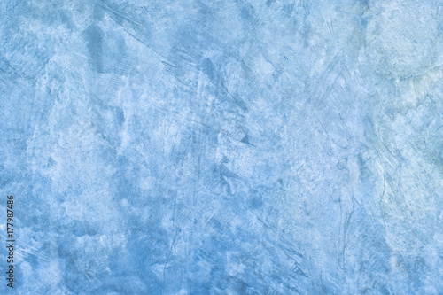 Abstract blue background raw exposed cement with texture.
