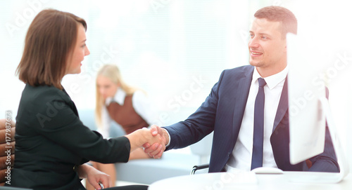 Wallpaper Mural Business partners shaking hands in meeting hall Torontodigital.ca