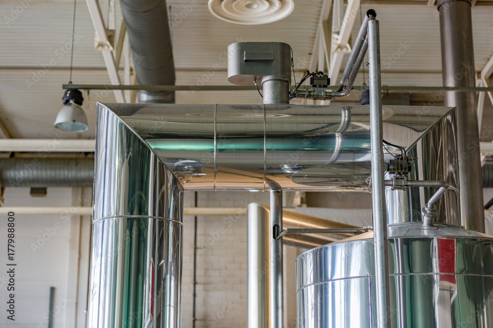 Obraz premium Equipment, industrial tools and machinery for the production of beer in factory shops