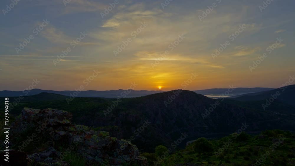 Brilliant summit sunrise time lapse above flowing foggy waves in the mountain valley in HDR Brilliant summit sunrise time lapse above flowing foggy waves in the mountain valley in HDR