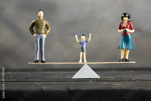 The Concept of Divorce , A Child Between Two Parents photo